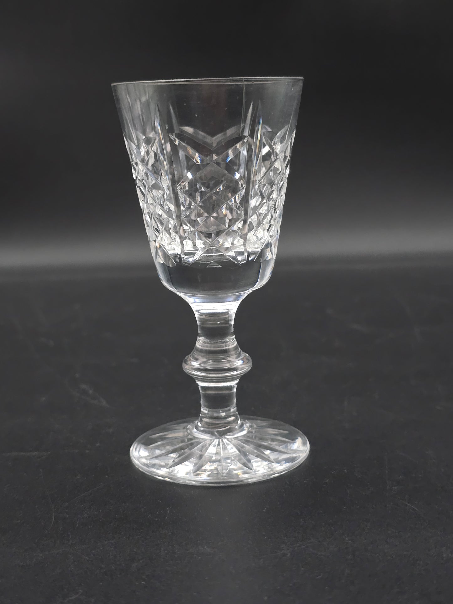 Set of 4 Edinburgh Crystal Highland pattern Crystal sherry or liqueur glasses 75ml. 11.5cm tall