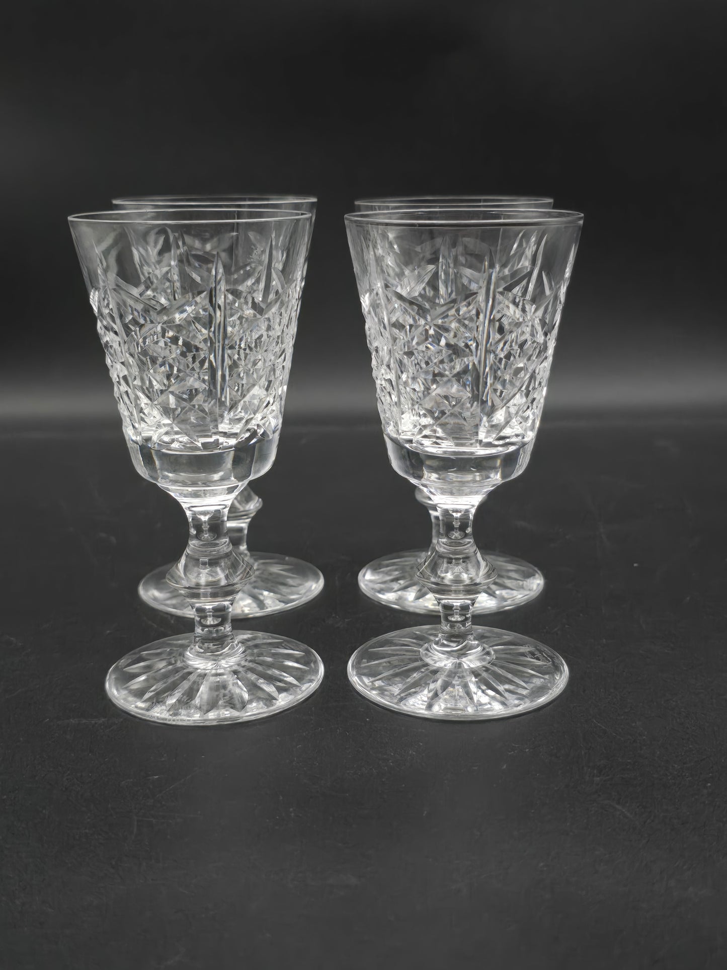 Set of 4 Edinburgh Crystal Highland pattern Crystal sherry or liqueur glasses 75ml. 11.5cm tall