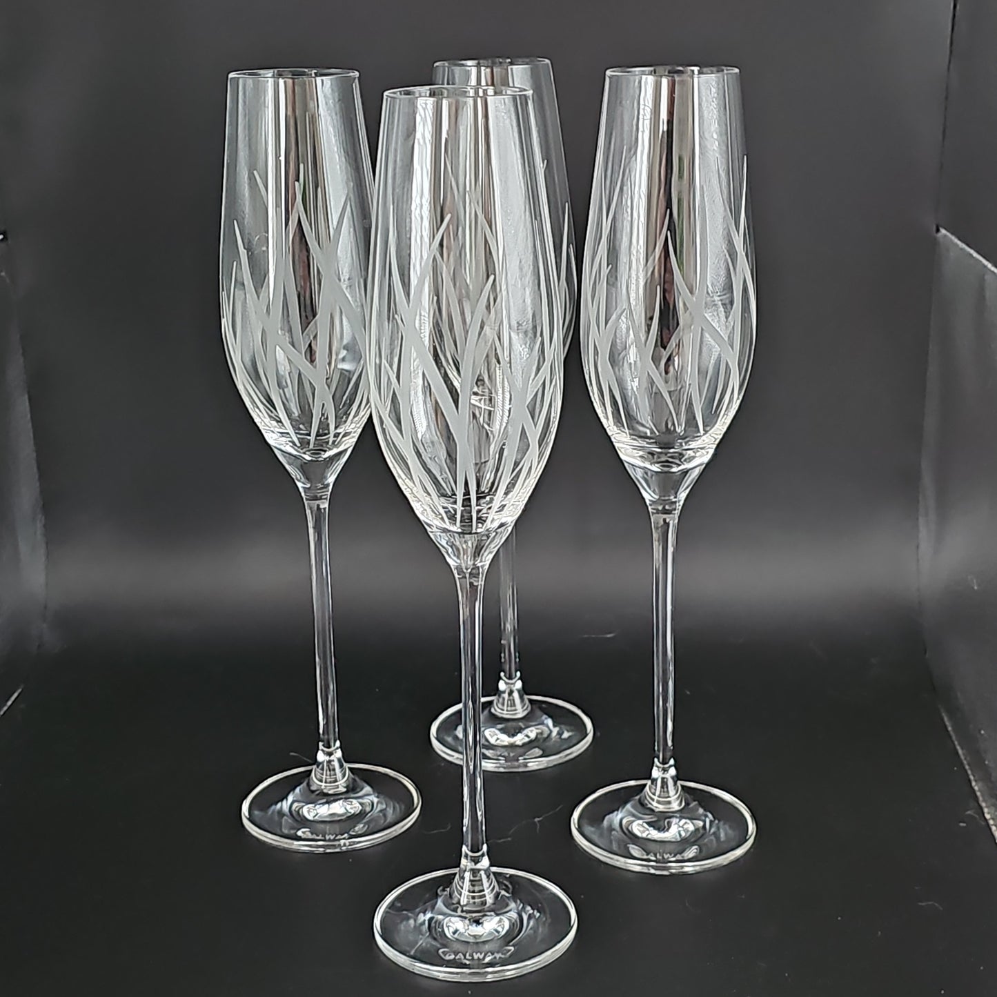 Galway Living Crystal Fire pattern Champagne flutes. Set of 4.