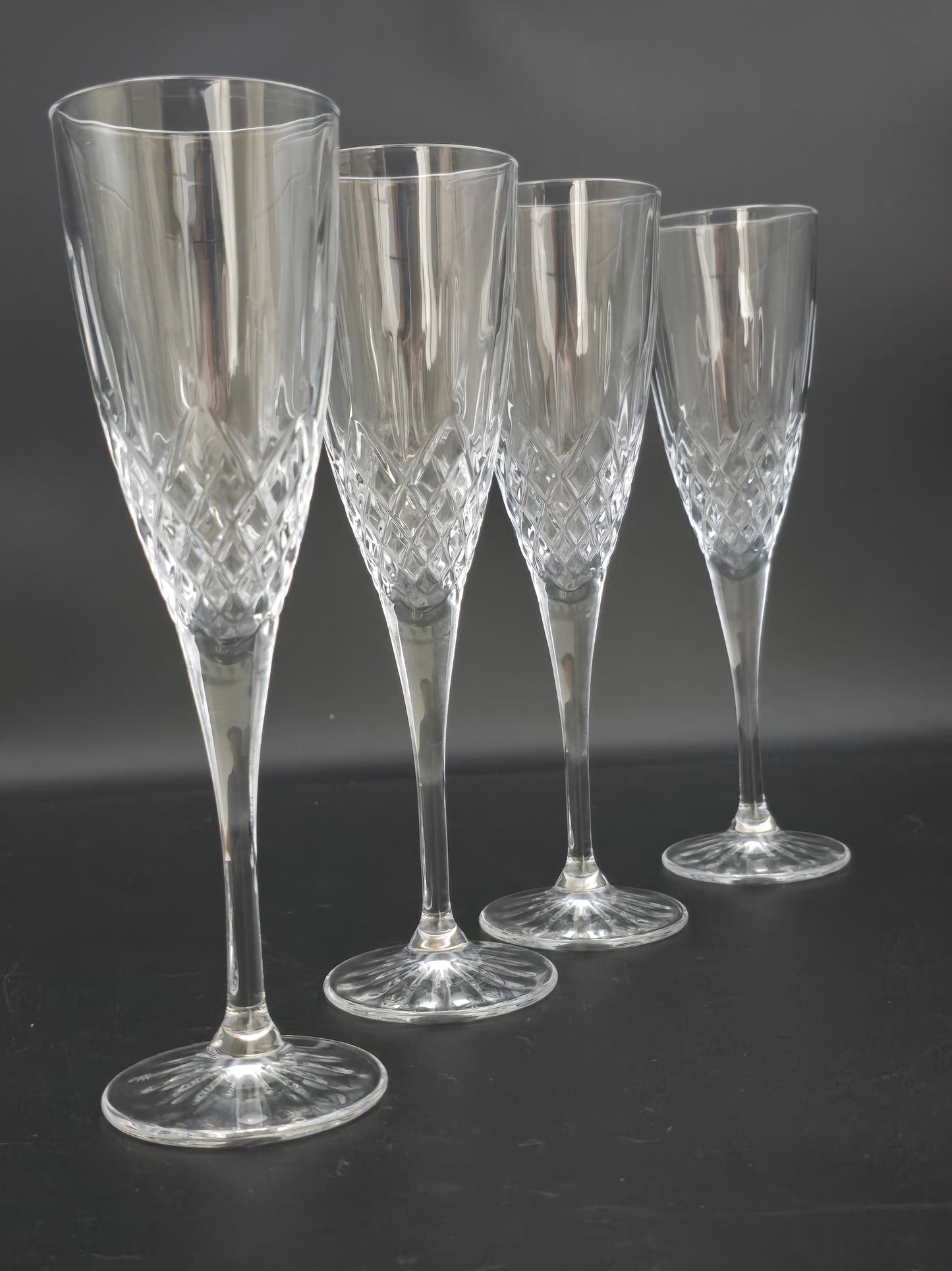 Set of 4 Royal Doulton Earlswood Pattern Crystal Champagne Flutes.  150ml. 21cm tall.
