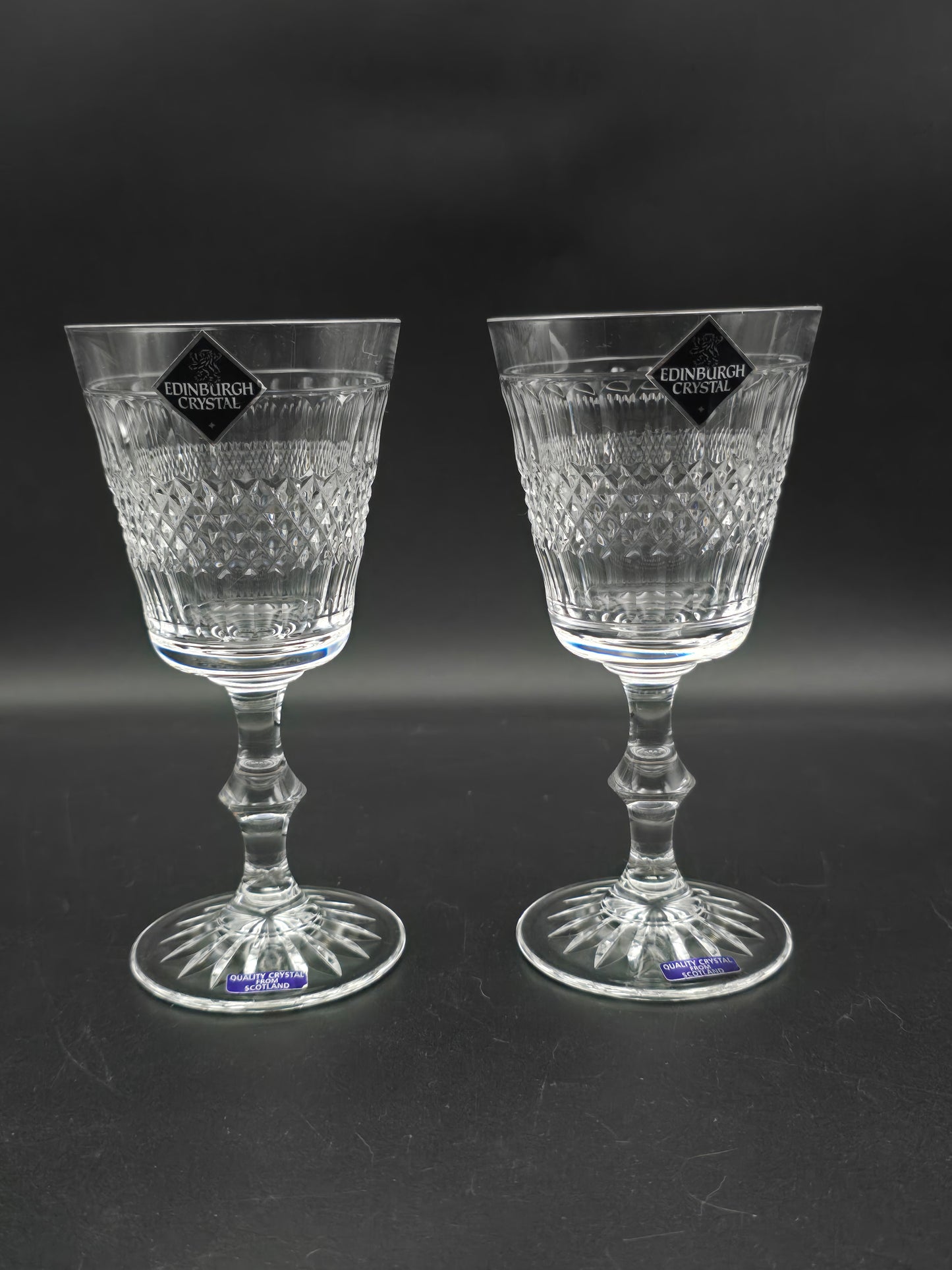 Pair of Edinburgh Crystal Cameron Pattern Crystal wine glasses, boxed. 200ml