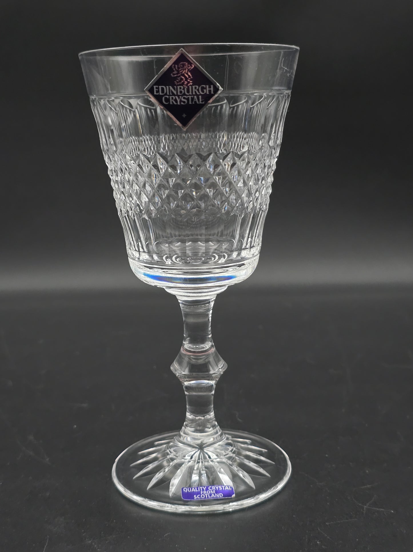 Pair of Edinburgh Crystal Cameron Pattern Crystal wine glasses, boxed. 200ml