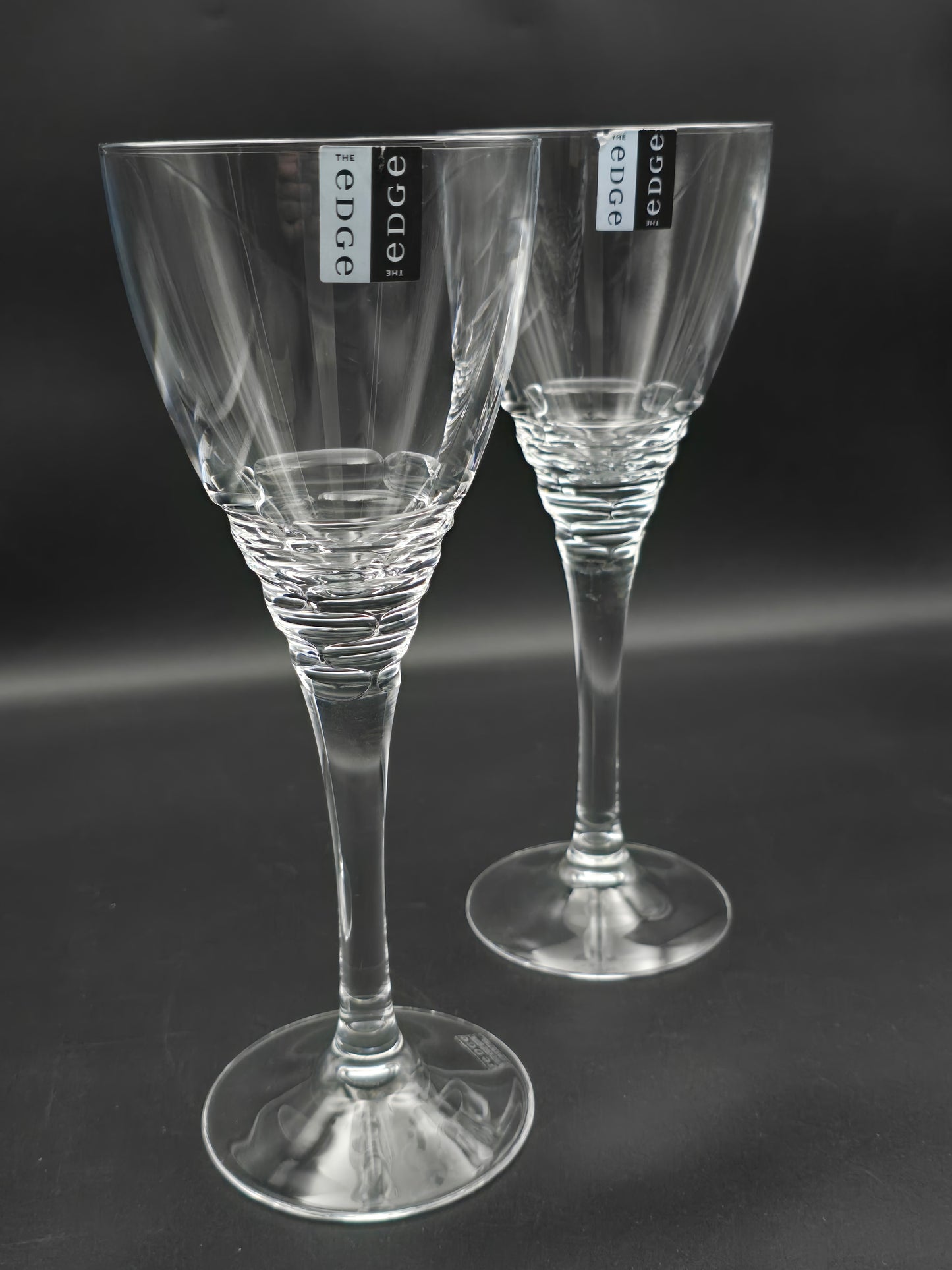 Pair of Large Edinburgh Crystal The Edge Collection Cirrus pattern wine glasses 350ml 24.5cm tall.