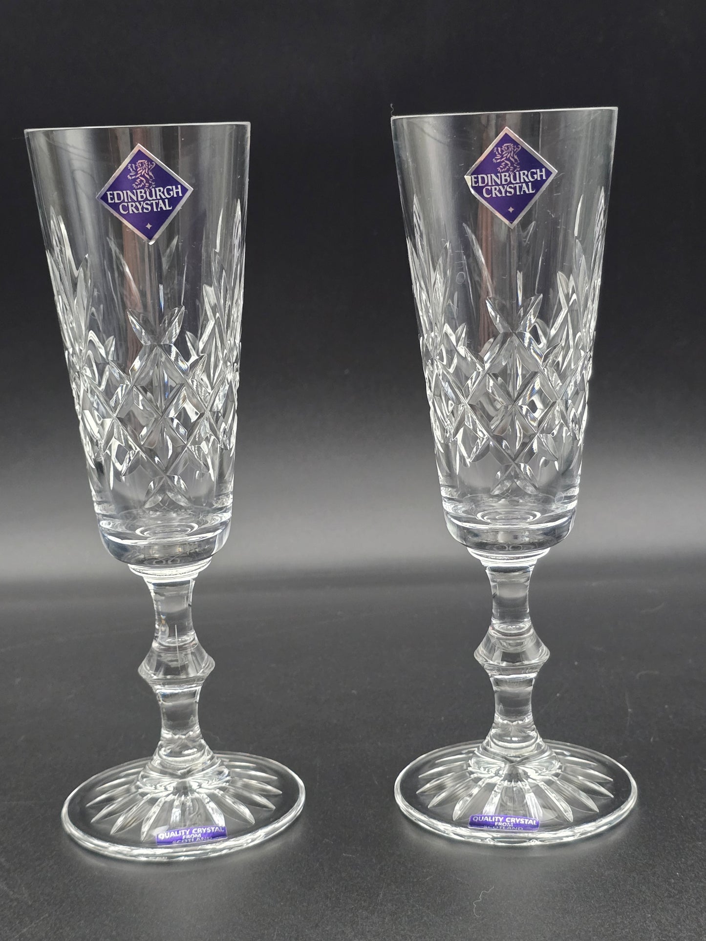 Pair of Edinburgh Crystal Lomond Pattern Crystal Champagne Flutes. 150ml. 19.5cm tall. Boxed.