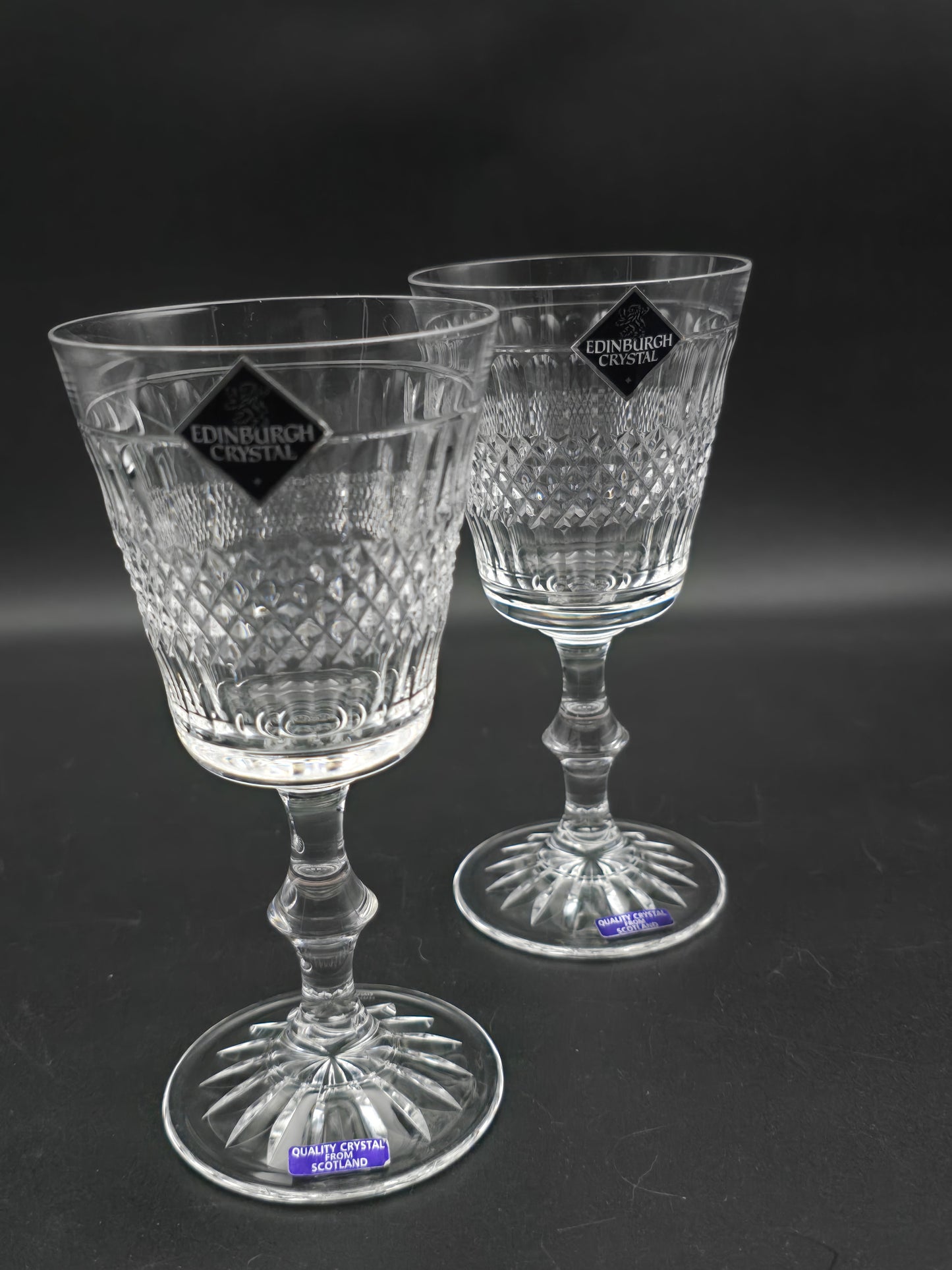 Pair of Edinburgh Crystal Cameron Pattern Crystal wine glasses, boxed. 200ml