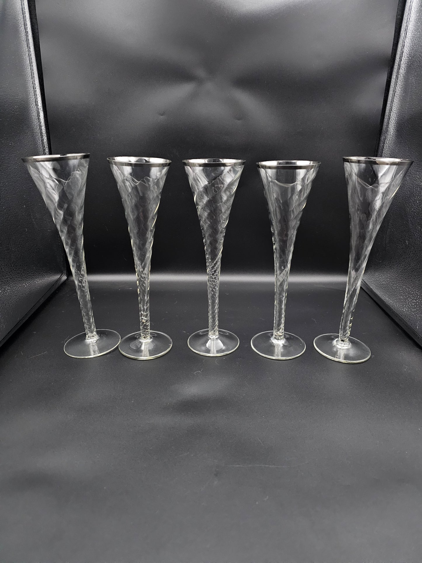 5 Hollow stemmed Tall Crystal Champagne flutes with silver coloured rims. 25cm tall. 200ml