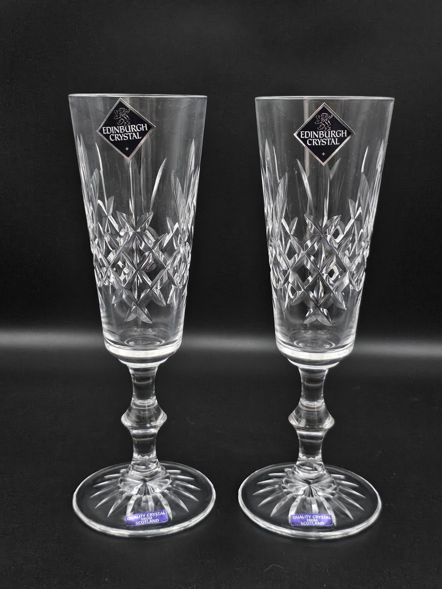 Pair of Edinburgh Crystal Champagne flutes in original box