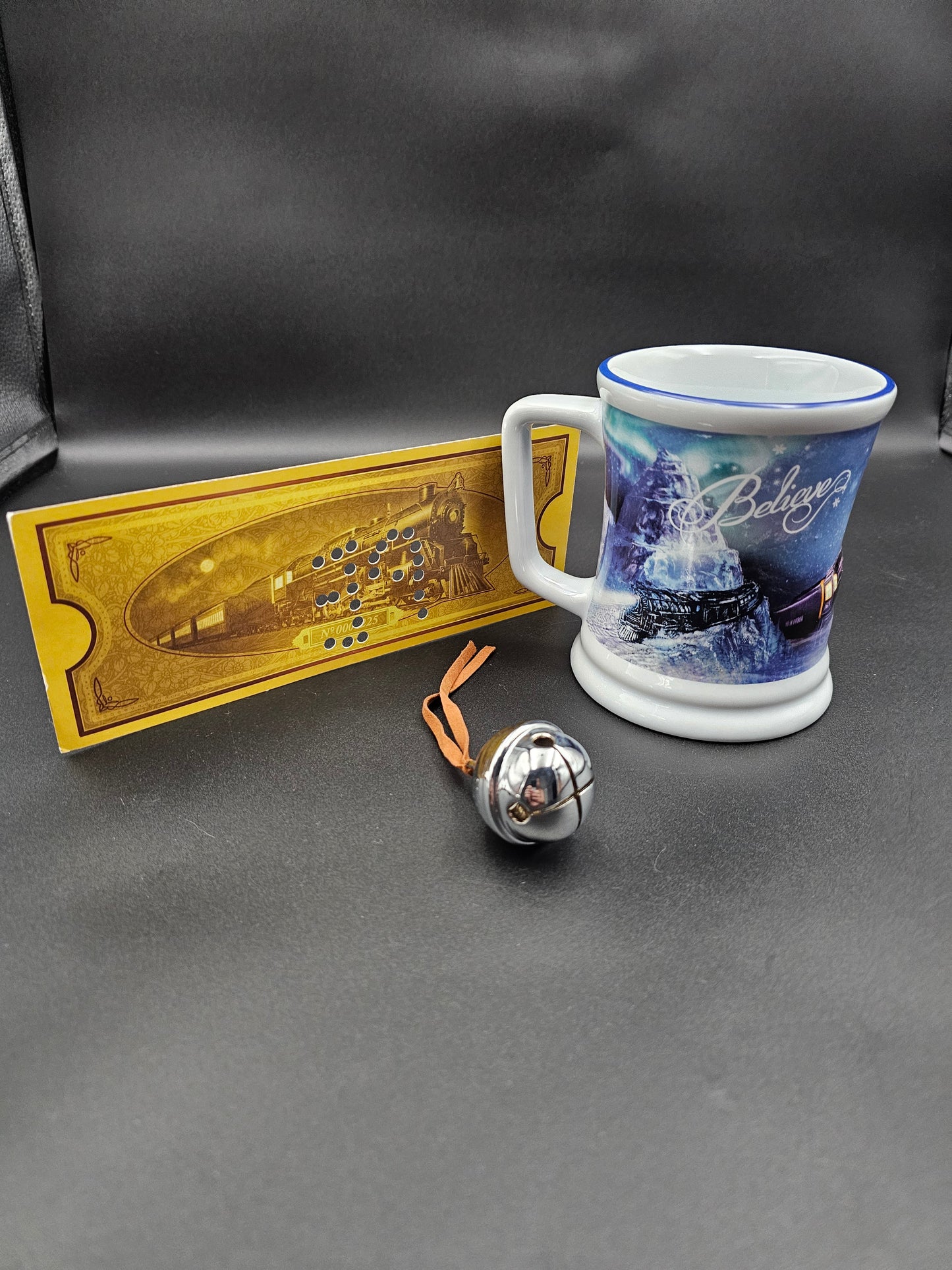 The Polar Express First class ticket set. Mug, Bag, Bell and Ticket