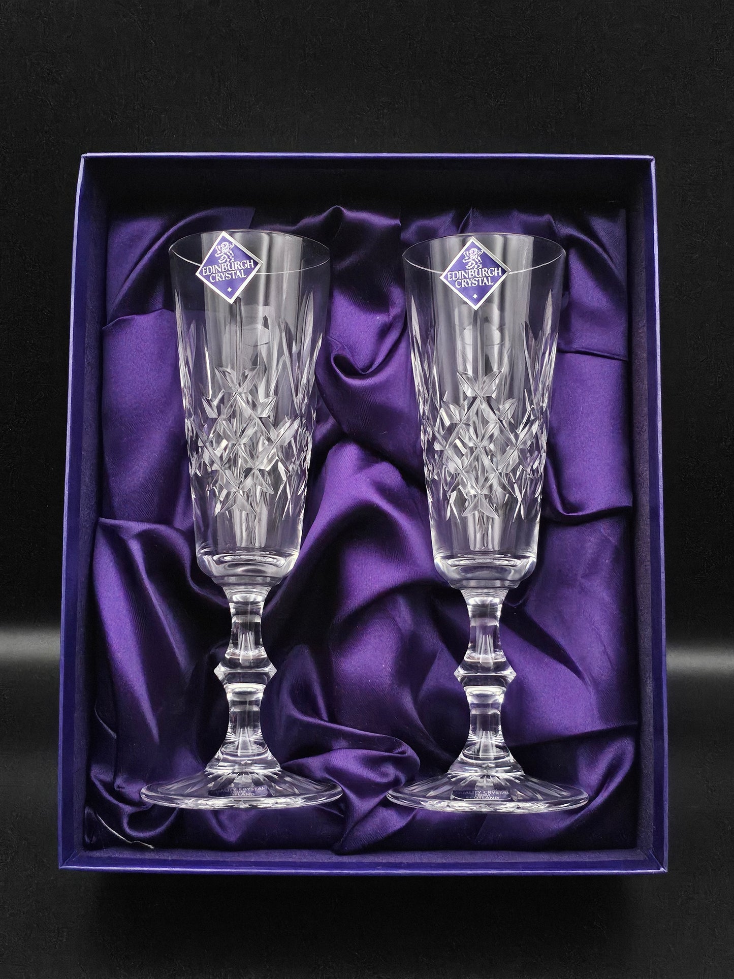 Pair of Edinburgh Crystal Champagne flutes in original box