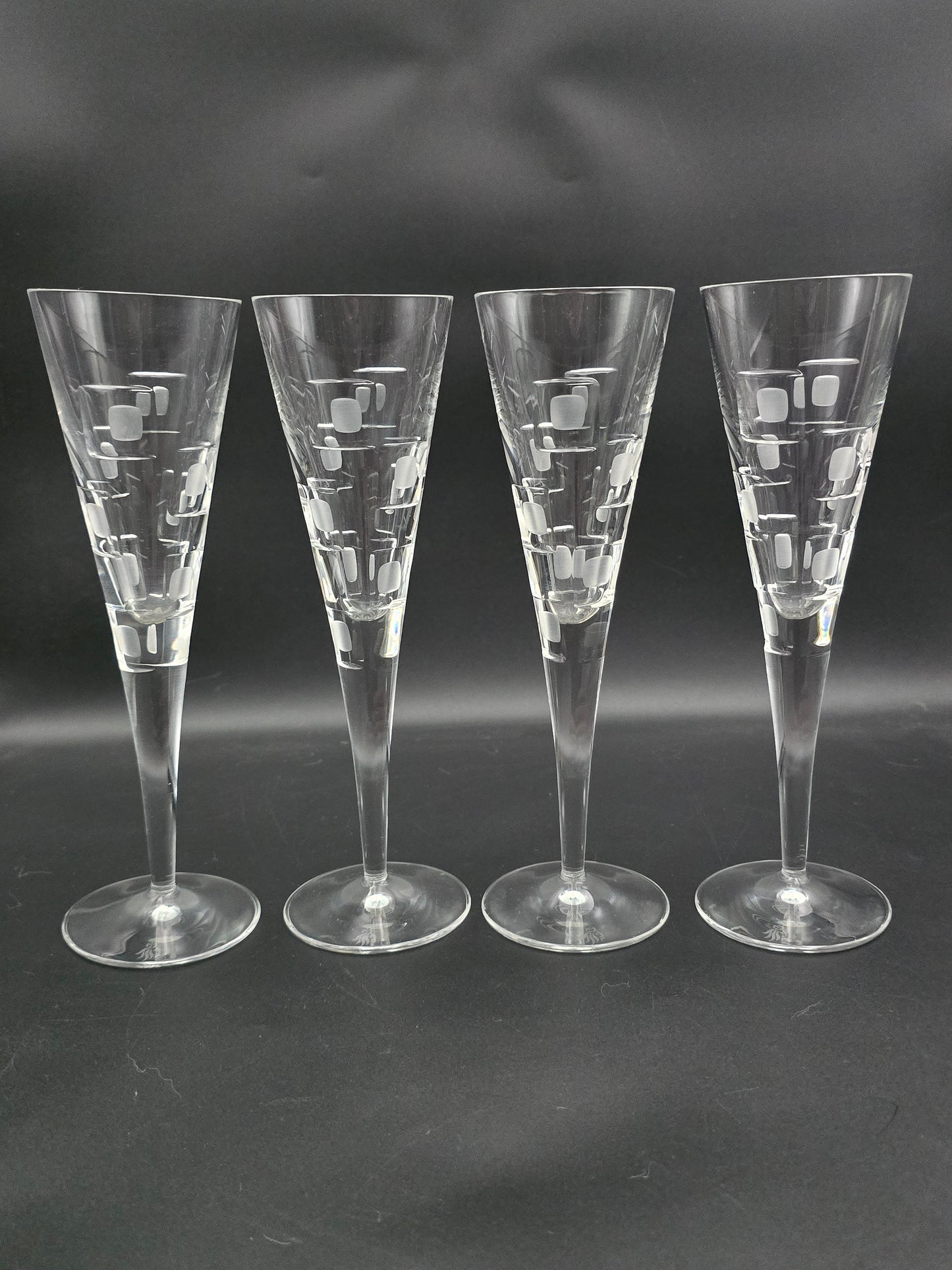 Set of 4 Royal Doulton Metro Pattern Crystal champagne flutes. 150ml 23cm tall