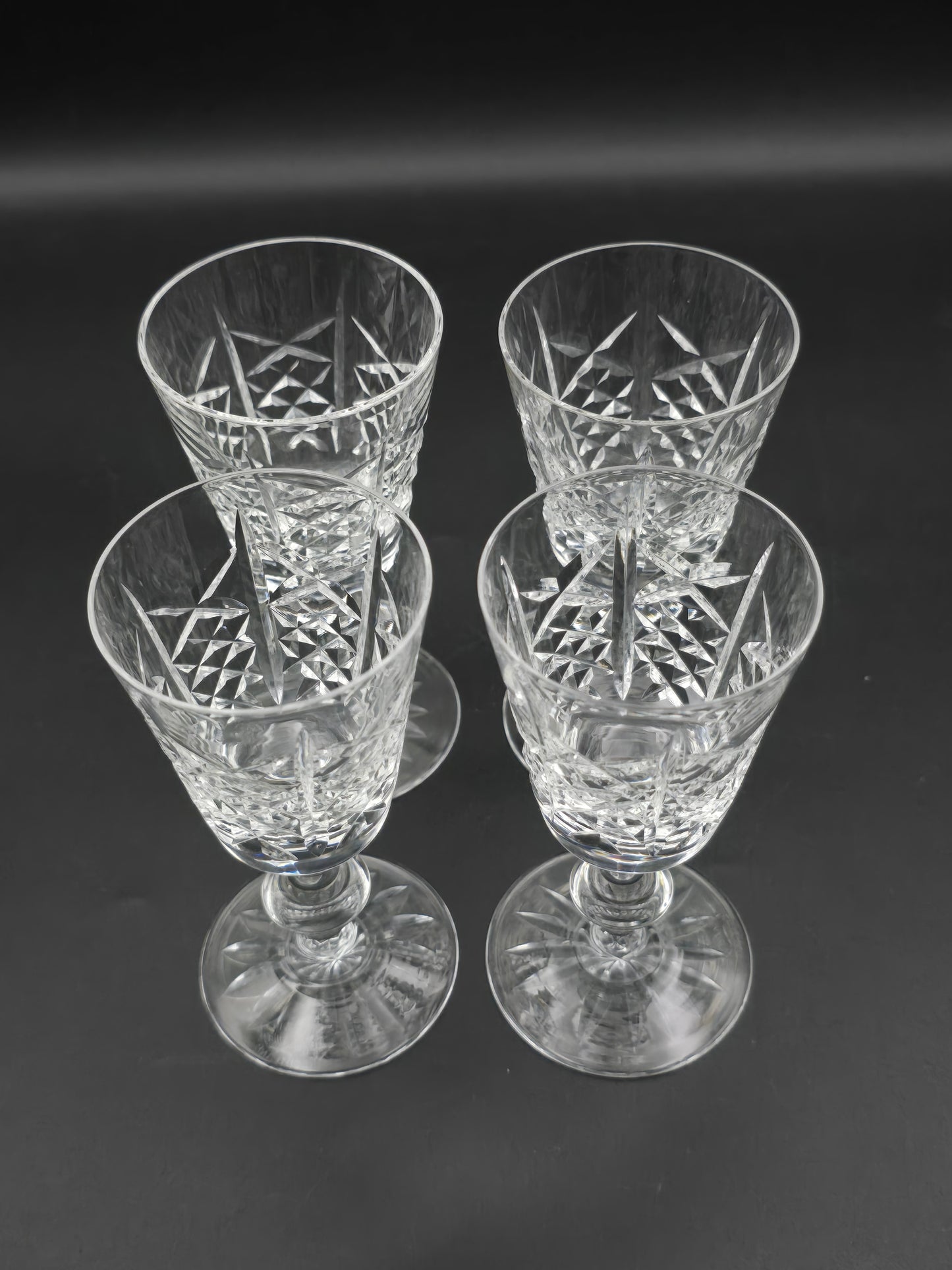 Set of 4 Edinburgh Crystal Highland pattern Crystal sherry or liqueur glasses 75ml. 11.5cm tall