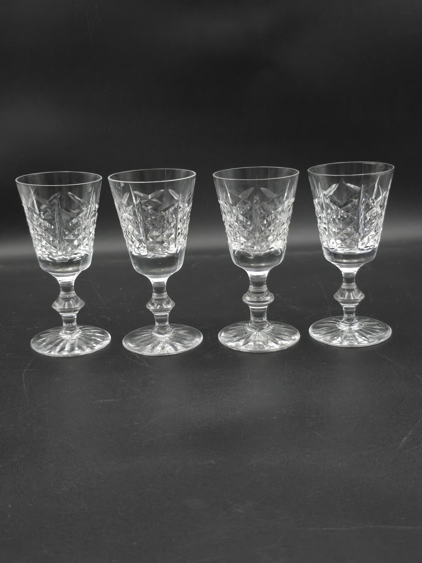 Set of 4 Edinburgh Crystal Highland pattern Crystal sherry or liqueur glasses 75ml. 11.5cm tall
