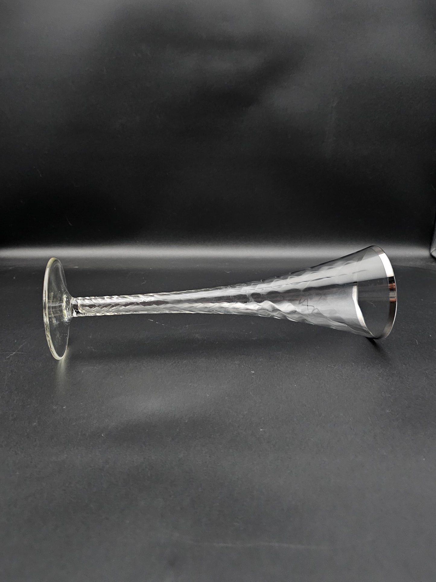 5 Hollow stemmed Tall Crystal Champagne flutes with silver coloured rims. 25cm tall. 200ml