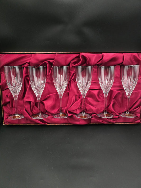 Set of 6 Royal Doulton International Crystal Champagne Flutes. Boxed 150ml.  18.5cm tall.