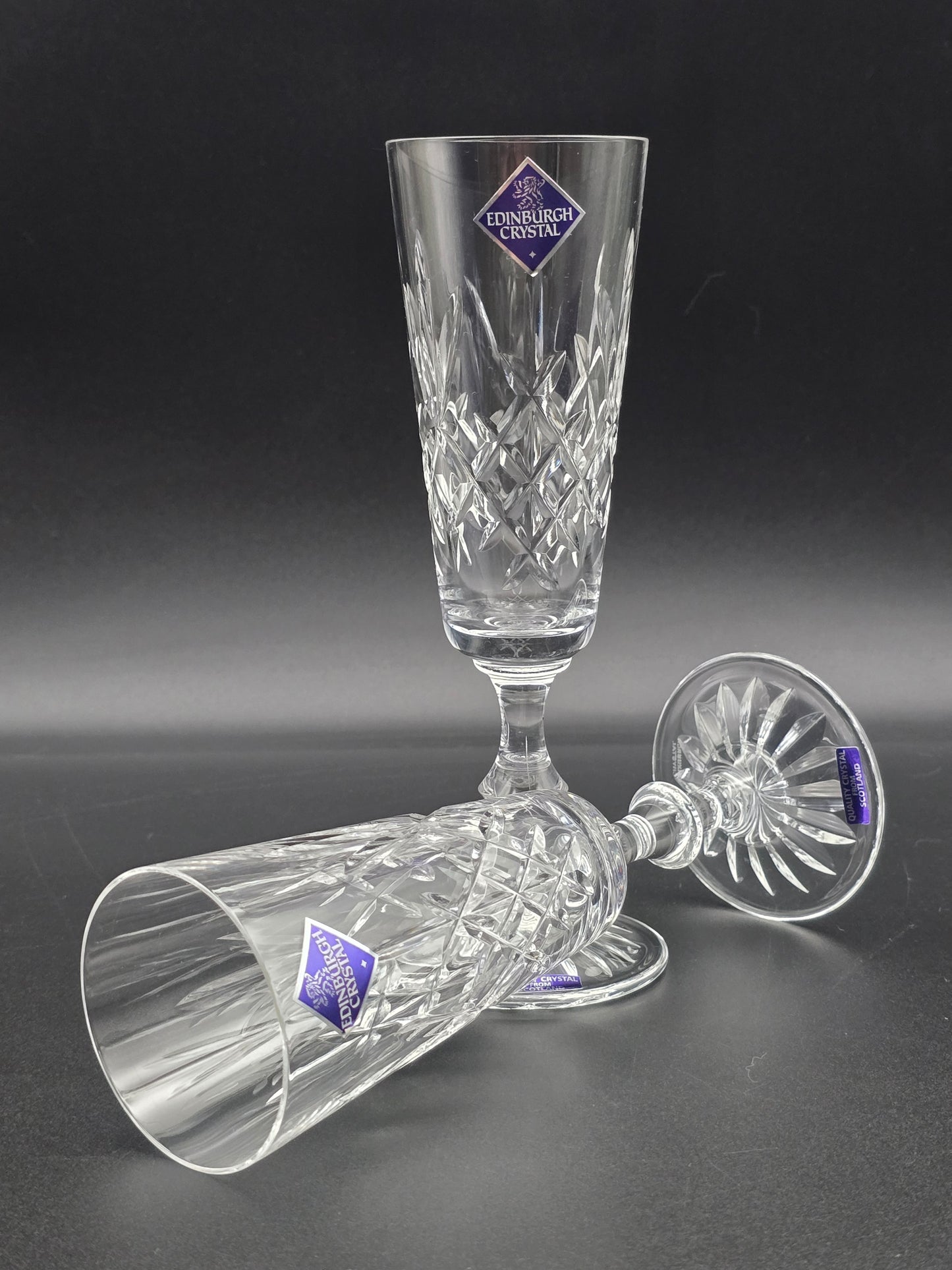 Pair of Edinburgh Crystal Lomond Pattern Crystal Champagne Flutes. 150ml. 19.5cm tall. Boxed.
