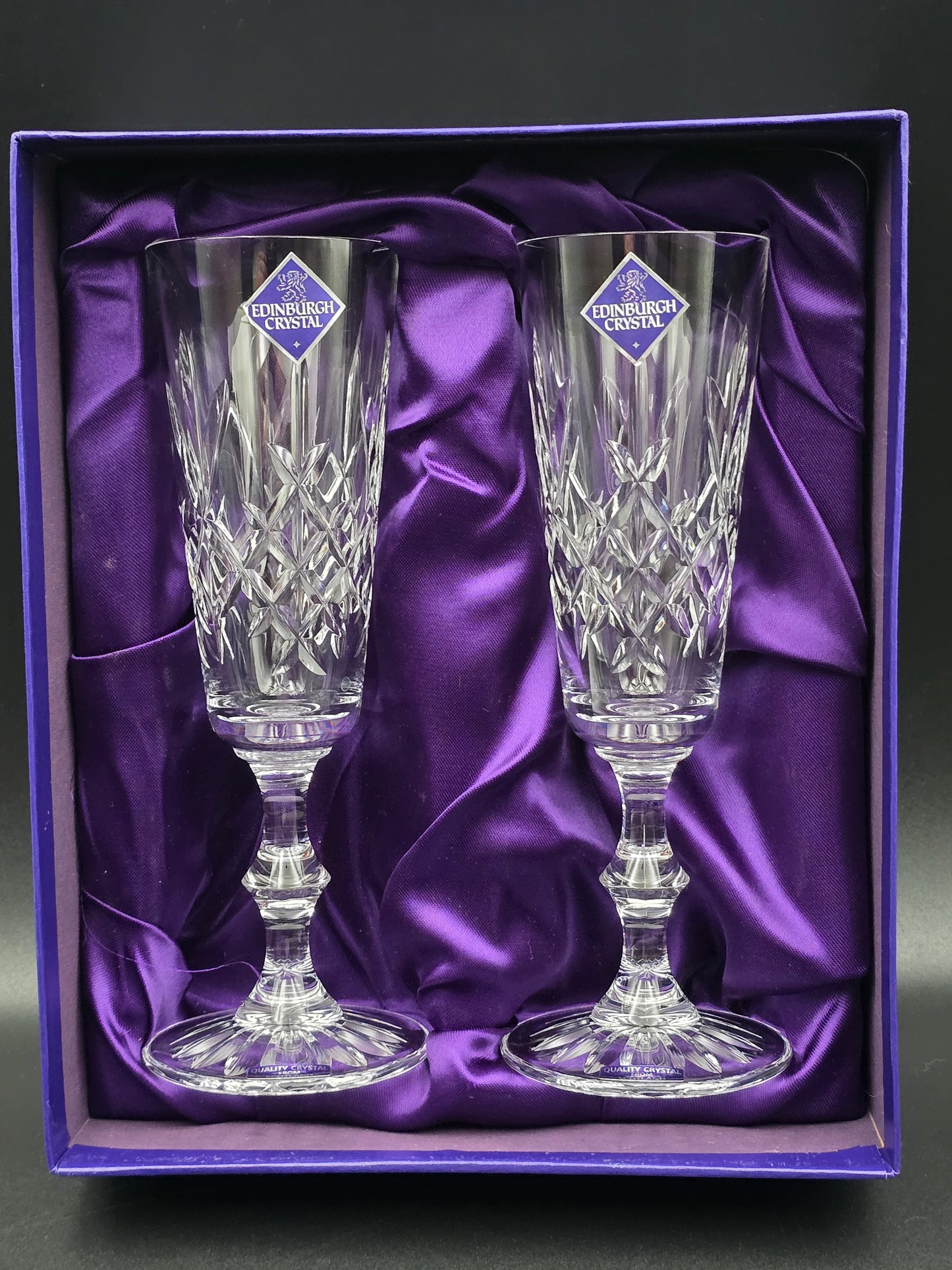 Pair of Edinburgh Crystal Lomond Pattern Crystal Champagne Flutes. 150ml. 19.5cm tall. Boxed.