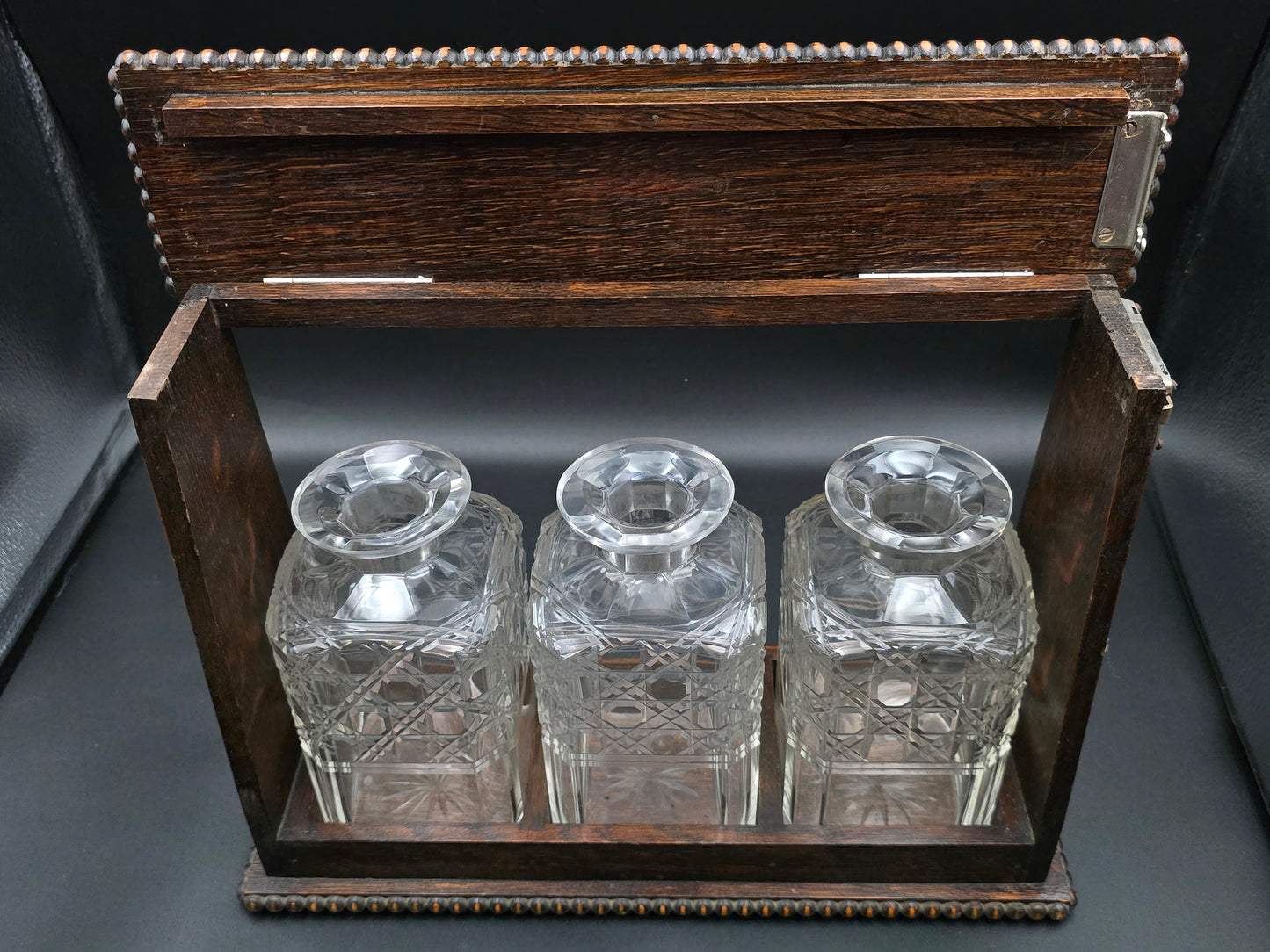 Antique Triple Decanter Tantalus Set with Lock & Key – Cut Crystal & Wooden Frame with Brass Lion Fittings – Excellent Condition
