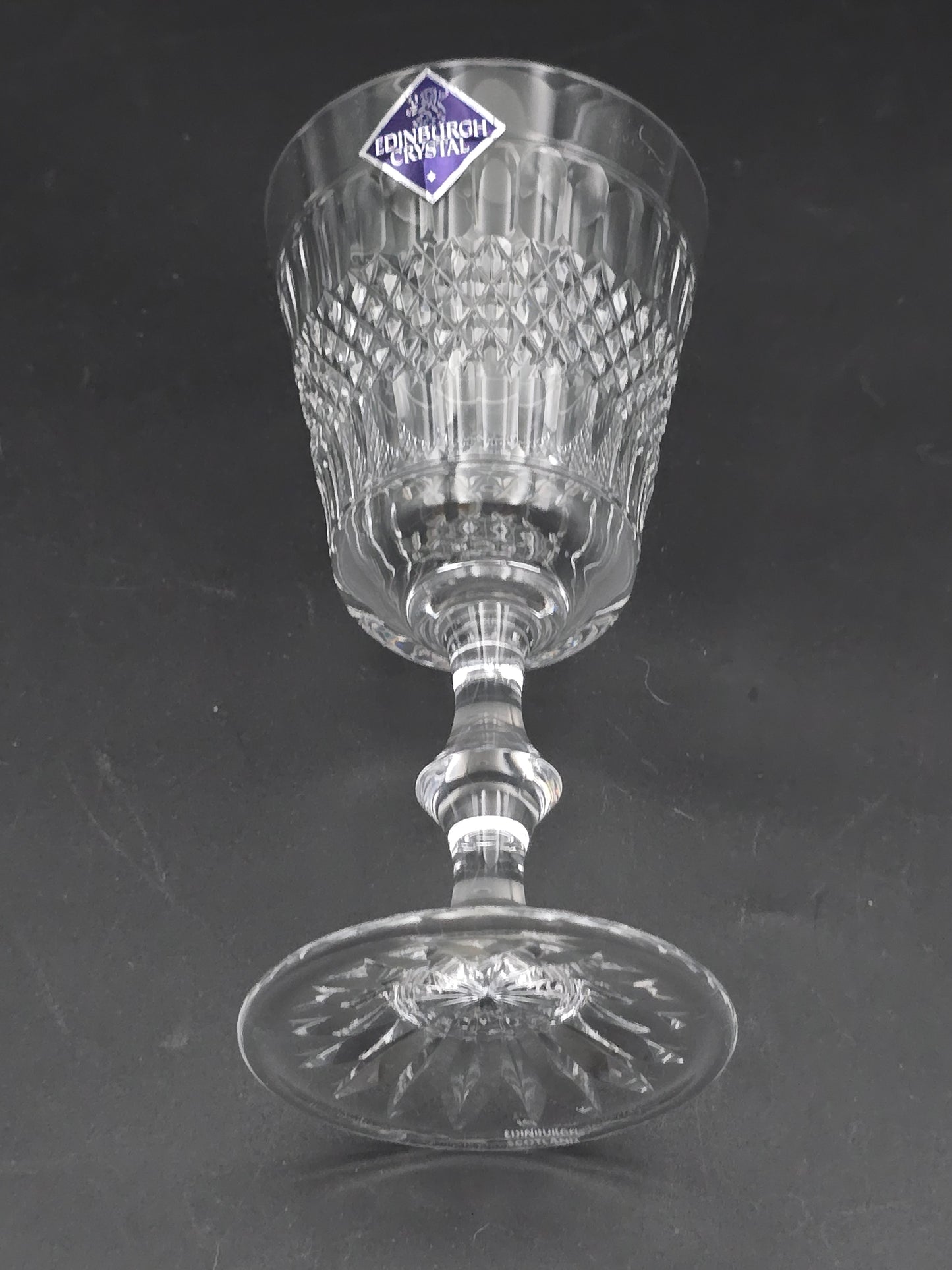 Pair of Edinburgh Crystal Cameron Pattern Crystal wine glasses, boxed. 200ml