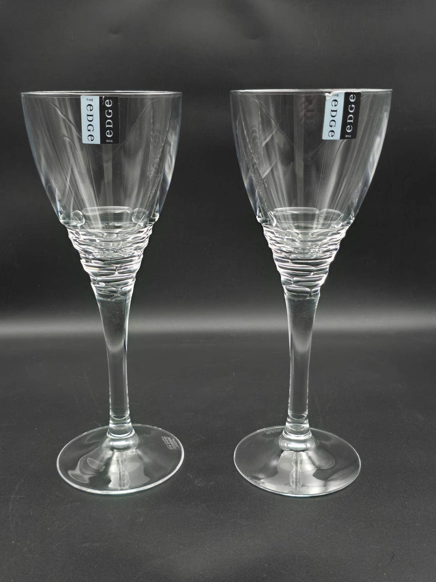 Pair of Large Edinburgh Crystal The Edge Collection Cirrus pattern wine glasses 350ml 24.5cm tall.