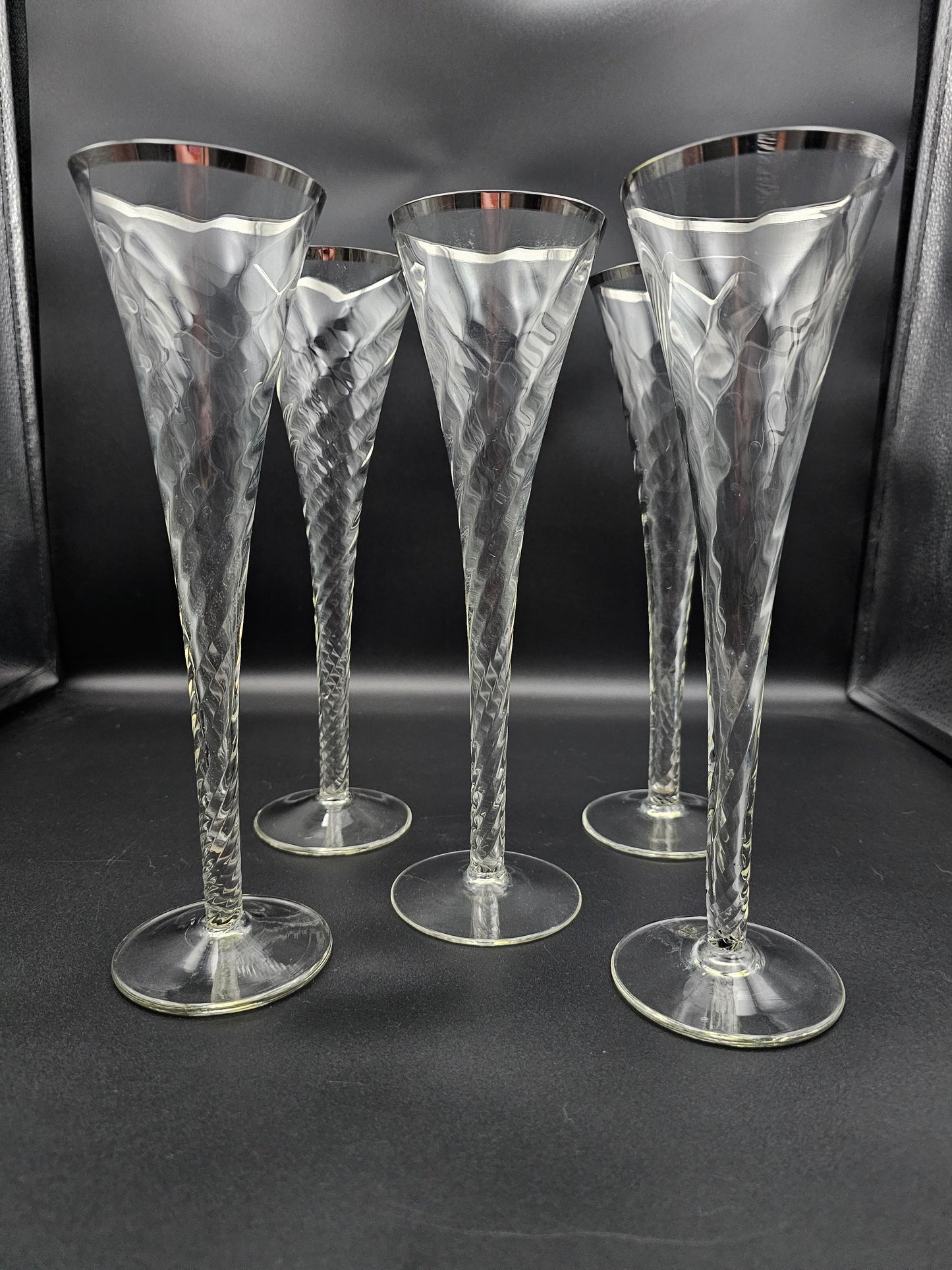 5 Hollow stemmed Tall Crystal Champagne flutes with silver coloured rims. 25cm tall. 200ml