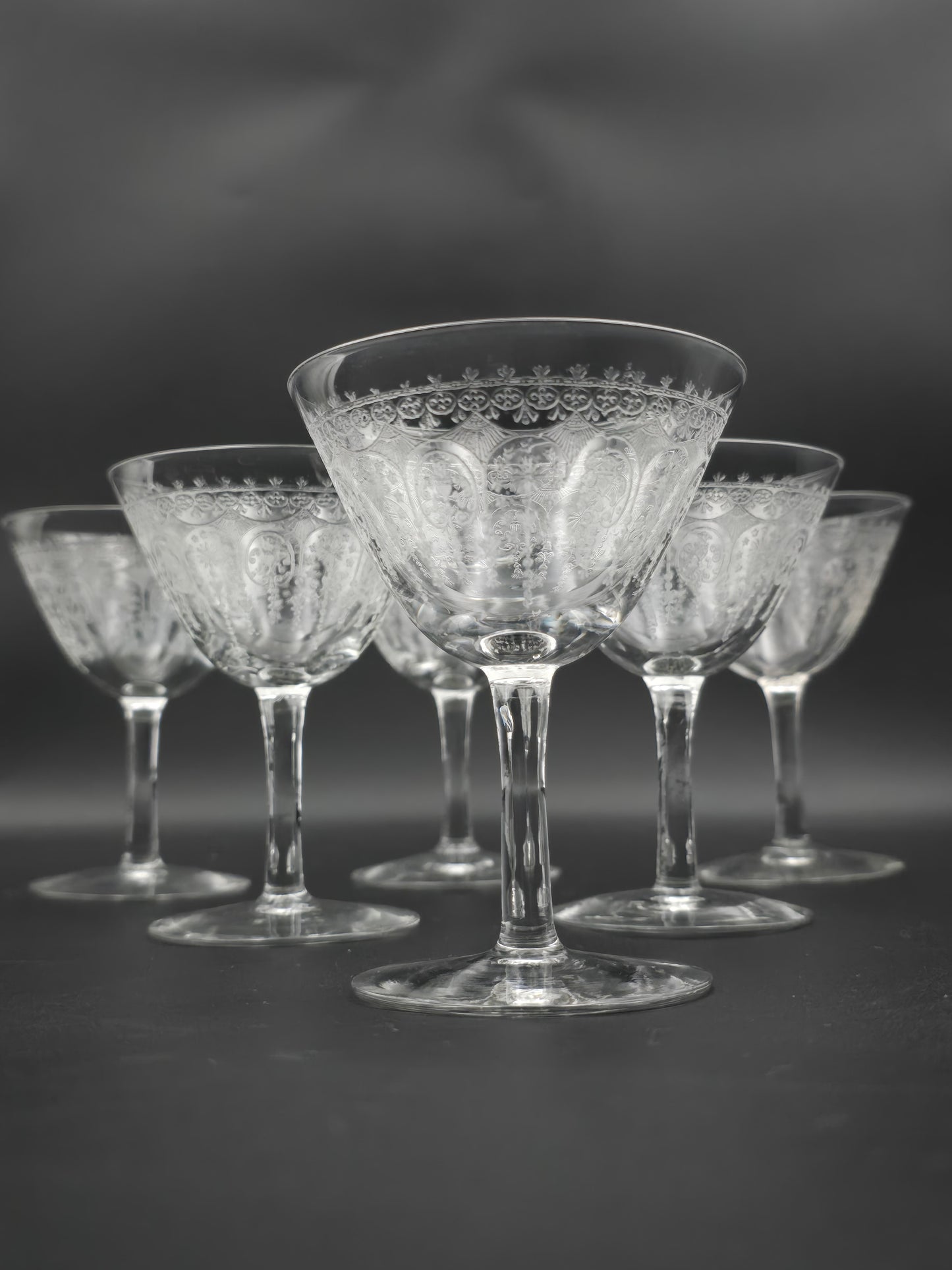 Set of 6 Beautifully etched crystal champagne coupes. 125ml. 11cm tall