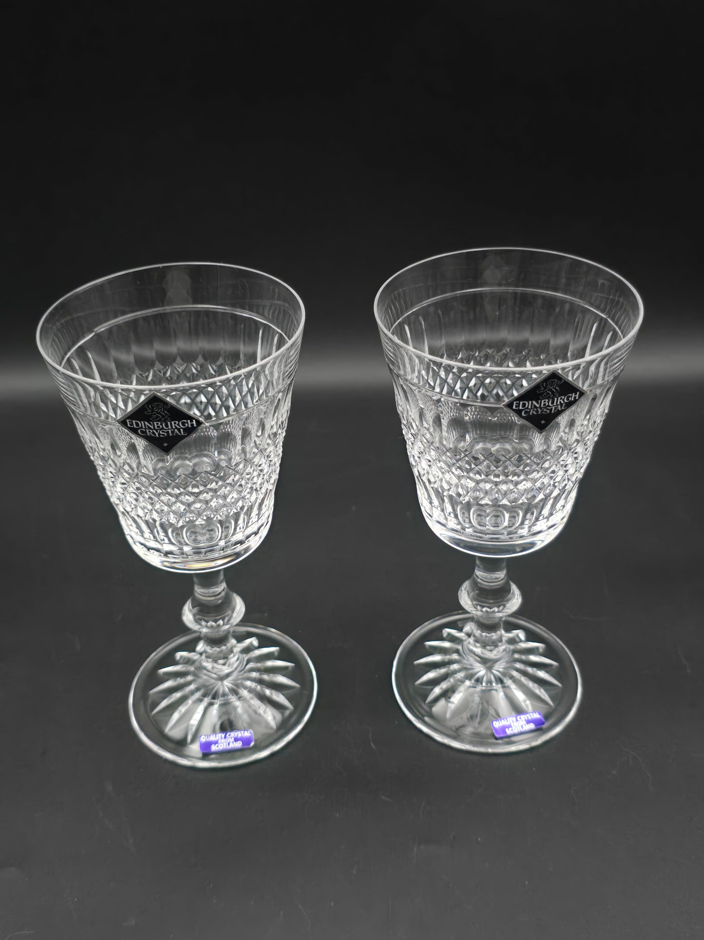 Pair of Edinburgh Crystal Cameron Pattern Crystal wine glasses, boxed. 200ml