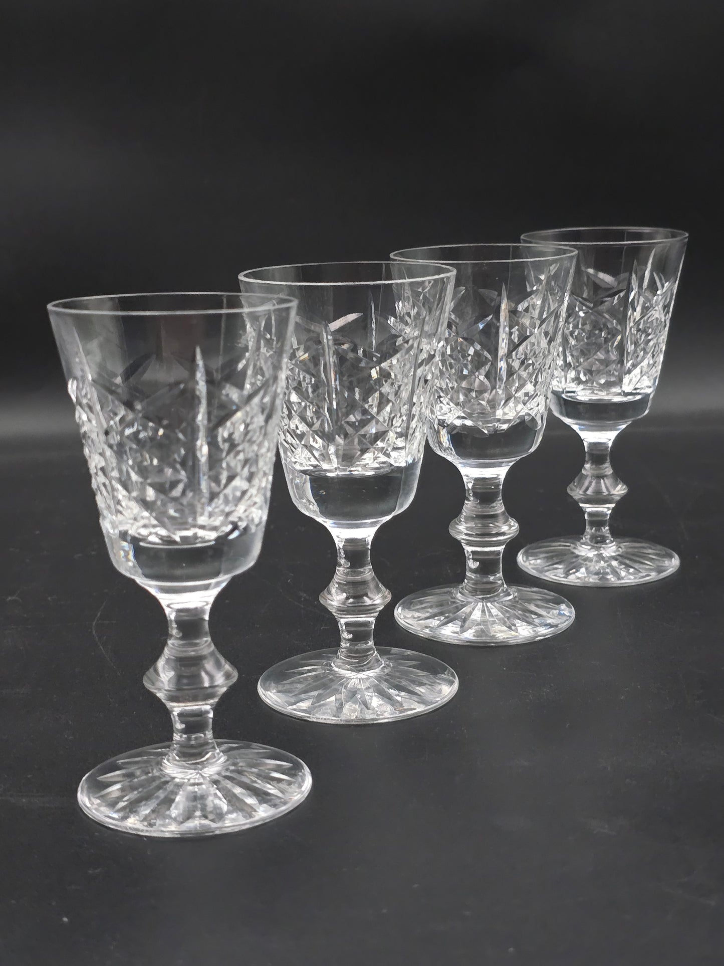 Set of 4 Edinburgh Crystal Highland pattern Crystal sherry or liqueur glasses 75ml. 11.5cm tall