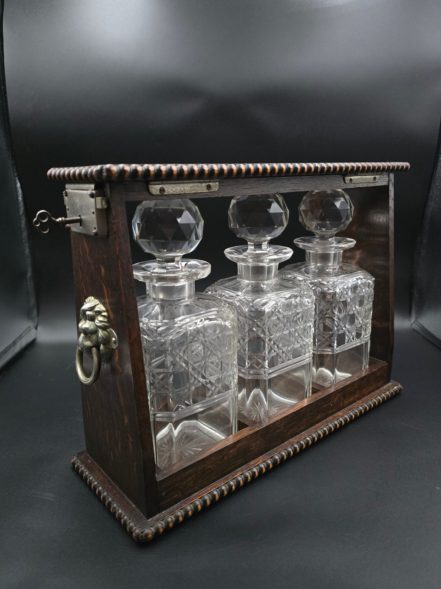 Antique Triple Decanter Tantalus Set with Lock & Key – Cut Crystal & Wooden Frame with Brass Lion Fittings – Excellent Condition